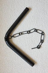Corner bracket with chain