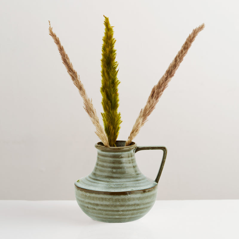 Green glazed handcrafted stoneware vase
