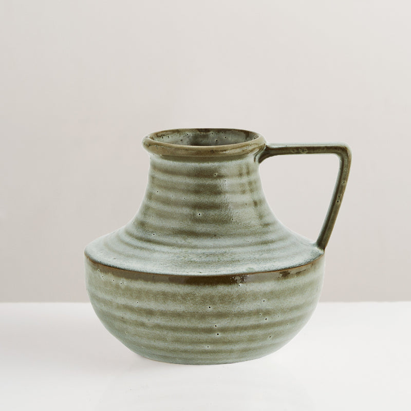Green glazed handcrafted stoneware vase