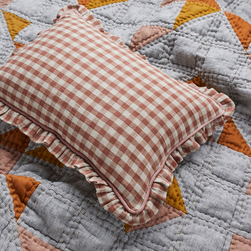 Wes gingham blush frill cushion