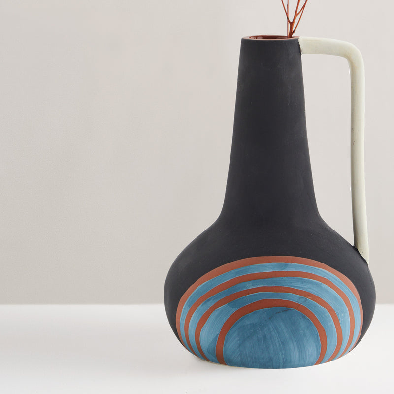 Hand painted terracotta glazed vase with handle